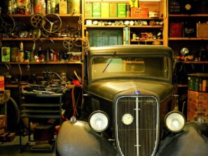 black classic car inside the garage